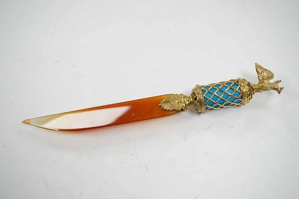 A continental gilt white metal and enamel mounted agate paper knife, 22.5cm. Condition - good